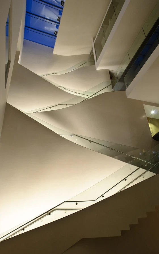 Rick Mather Architects’ radical redesign of the Ashmolean Museum in Oxford nevertheless has a light touch, exemplified by its ethereal, glass-balustraded staircase; photo Andy Matthews