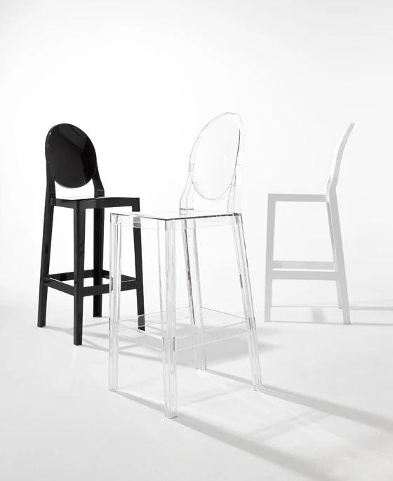 With over two million pieces sold worldwide, Philippe Starck's iconic 'Louis Ghost' chair can be found at, among other places, the Ristorante Cavoli a Merenda in Milan. Also shown here, Starck's companion single-mould 'One More' bar stool