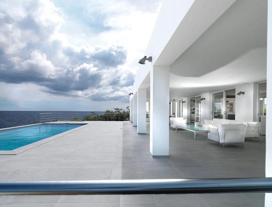 Kartell products have been specified internationally for exterior contract environments. Shown here, the Museo dell'Ara in Rome ('Bubble Club' sofa), Baita La Grolla in Courmayeur, Italy ('Louis Ghost' chair), and Residence Lot on Curacao ('Pop Duo' sofa)