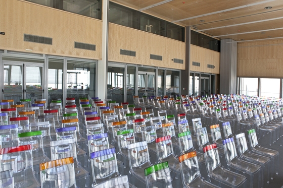 Cultural spaces are just one of many types of large-scale public venue to have been given the Kartell treatment. Shown here, the Museo d'Arte di Ravenna, Italy ('Magic Hole' chair), and the Concert Hall in Thessaloniki, Greece ('Hi-Cut' chair)