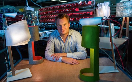 Liaison: Olaf Seynsche in his lamp workshop. His models combine unusual design with first-rate technology