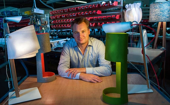 Liaison: Olaf Seynsche in his lamp workshop. His models combine unusual design with first-rate technology