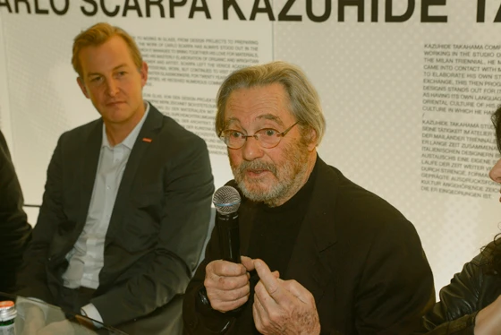 Tobia Scarpa speaks as part of a panel discussion at Cassina's Cologne showroom during imm cologne 2014 on the golden age of Italian design. On his right, Florian Löhle, North Europe Country Manager for Cassina