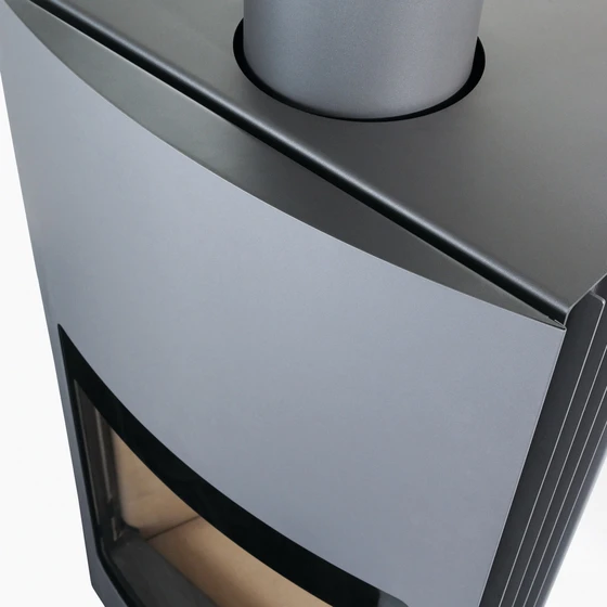 The 'Fuga eL' stove: 'It's like a good butler', says Bart Leenders, the product itself receding optically when lit, foregrounding its fiery load