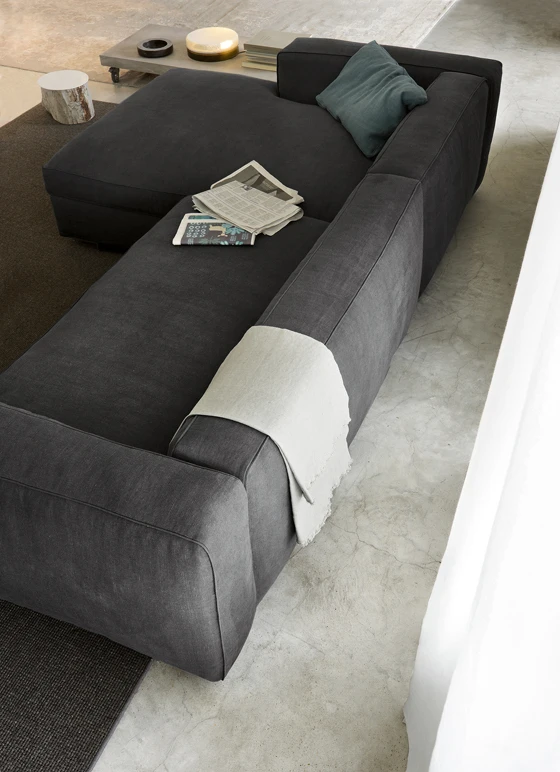 Rota’s Snap sofa features simple geometric lines and generous upholstery, resulting in a comfortable seat that can be customised by changing the length, configuring it as a corner unit and adding poufs