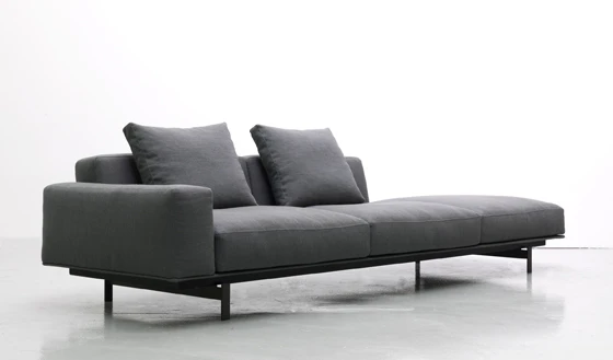The Yard sofa system by Francesco Rota combines upholstered seats with practical surfaces and storage that reflect LEMA’s specialism in modular furniture