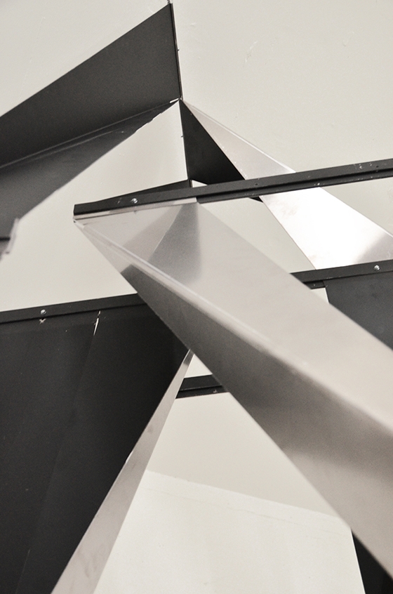 Highly angular, bent-aluminium elements slot into battens, S-shaped in profile, creating constructions in space that are based on repetition and difference