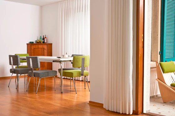 Neutra's steamlined 'Tremaine Side Chair', with angled tubular-steel legs