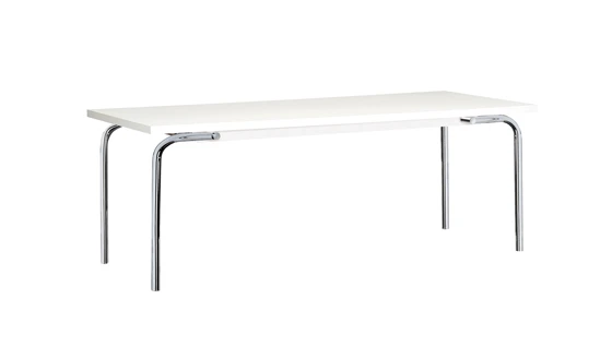 Highs and lows: the supremely comfortable 'Slipper Chair' (top) and the 'Camel Table' (above), which can be fixed at two heights, providing both coffee-table and dining-table functionality