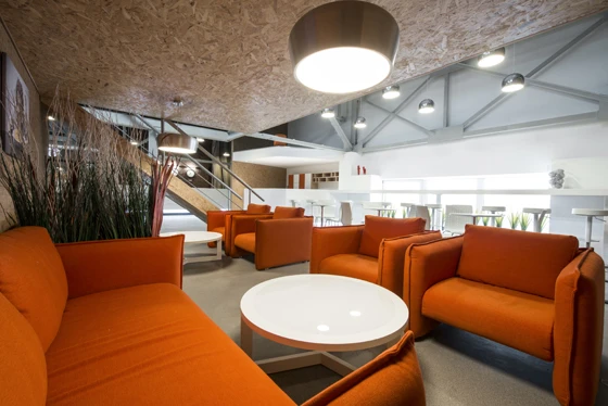 Nagatino 2.0 Co-working Center by Ruslan Aydarov Architecture Studio consists of a former furniture factory turned co-work space, with lounge-like working areas