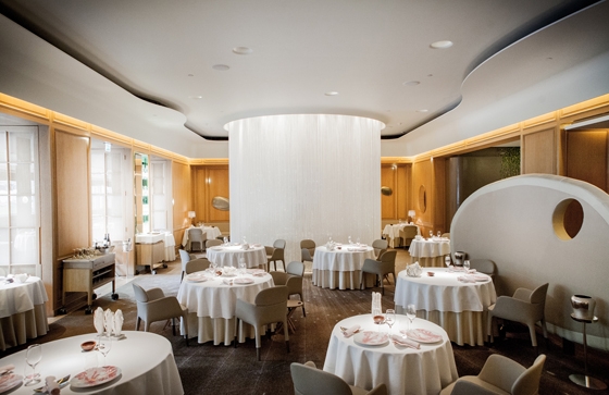 Patrick Jouin's 'Ester' armchairs installed at The Dorchester hotel's three-Michelin-starred restaurant in London, whose interiors were created by Jouin and Sanjit Manku; photo ®pierremonetta