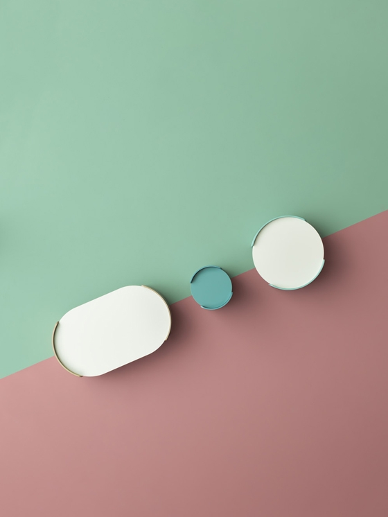 Claudio Dondoli and Marco Pocci's 'Parenthesis' family of rounded and reduced lounge/waiting-room and side tables