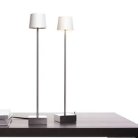 Simplicity: the forms of "CUT" by Torsten Neeland are reduced to the absolute minimum. It is available as a standard or table lamp.