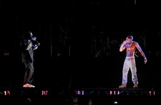 Tupac Shakur is resurrected by means of a computer-generated hologram at the Coachella music festival, taking holography from science fiction into science fact