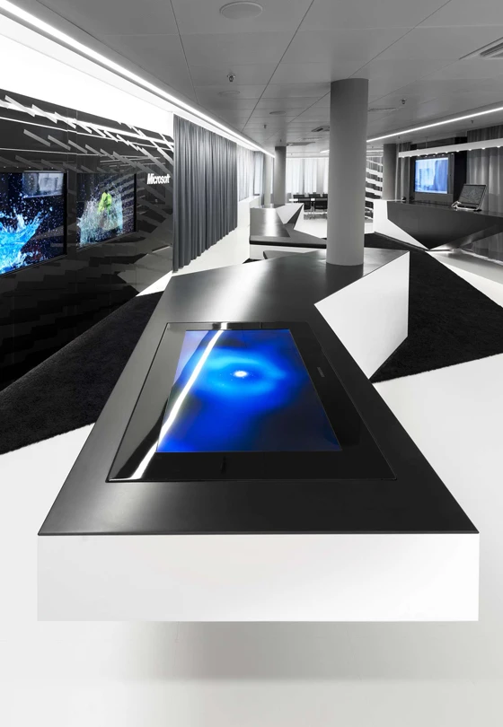 Media walls enable employees to give presentations using the company’s various types of audio-visual technologies, which are integrated into the face of the mill work