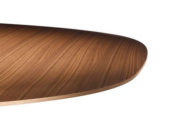 The programme is rounded off by a conference table which continues the formal idiom of the chair