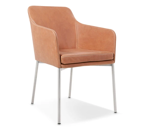 Cocooning: “Youma”, the new and extremely comfortable dining armchair by Austrian-based designer Sven Dogs, invites users to sink into it and make themselves at home