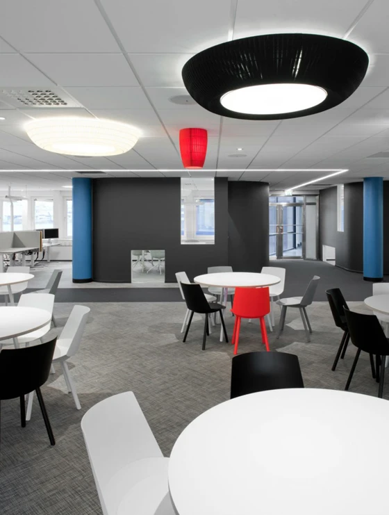 Open-plan office by Note Design illustrating the use of carpet as way to delineate different spaces within a 1,500-square-metre environment