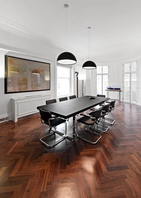 Herringbone timber flooring in the offices for an international shipping company by SHH