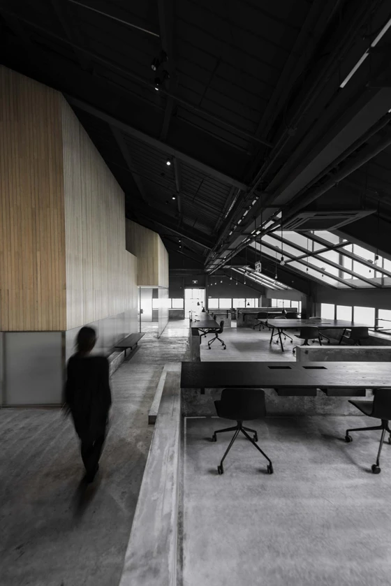 Flamingo Shanghai offices by Neri Hu. A striking landscape of concrete platforms and plinths that connect boldly into the polished concrete floor by Chinese design duo Lyndon Neri and Rossana Hu