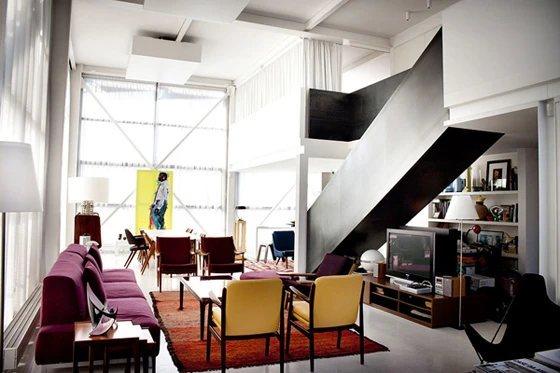 Airbnb by Gensler and Interior Design Fair: The Airbnb office is a hollowed out warehouse that accommodates nearly 200 employees. The space has a massive three-floor ‘Gsky’ living green wall and replicas of actual homes listed on the airbnb website