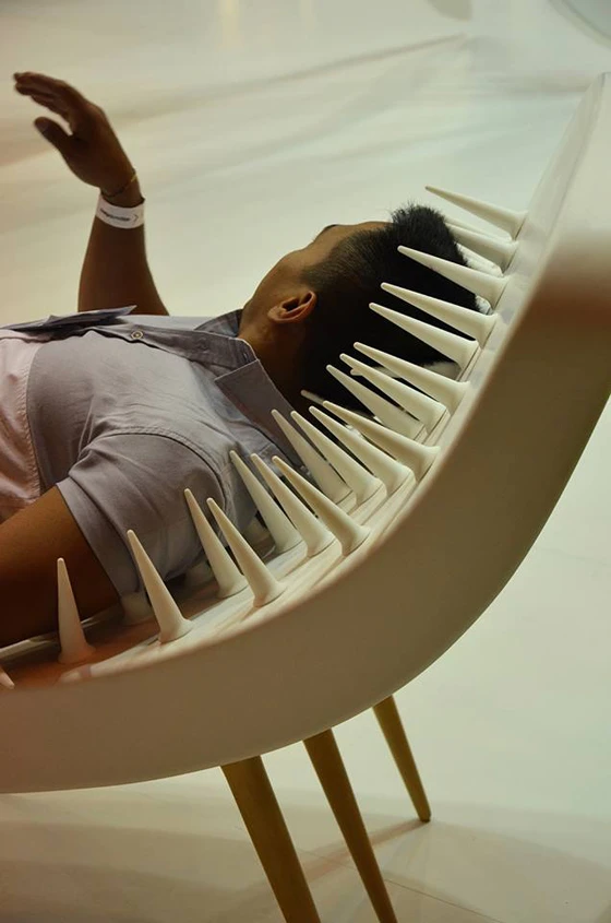 Daring visitors to the STARON® stand reclined on the surprisingly soft silicone spikes of the Hedgehog Sofa