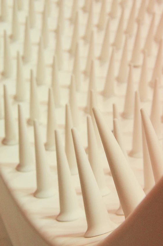 Rows of spikes contrasted with the curvaceous surface of the hedgehog sofa, demonstrating the kinds of complex shapes that can be produced using STARON®