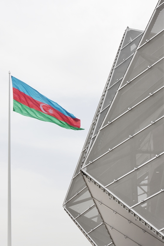 Constructed in just eight months, GMP Architekten and Nüssli International’s show-stopping 25,000-seater Baku Crystal Hall in Azerbaijan features an angular facade made of reflective PVC-PES mesh fabric and PVC-coated polyester