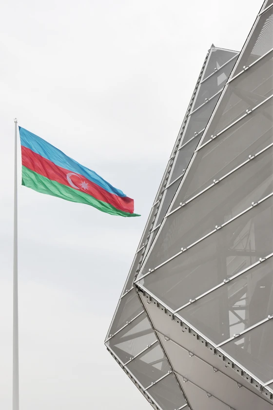 Constructed in just eight months, GMP Architekten and Nüssli International’s show-stopping 25,000-seater Baku Crystal Hall in Azerbaijan features an angular facade made of reflective PVC-PES mesh fabric and PVC-coated polyester