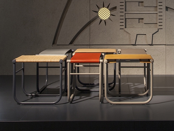 The LC9 stool is also suitable as a table or a place for storing books and magazines. Its fresh combinations of colours and materials make it an eye-catcher in any living room