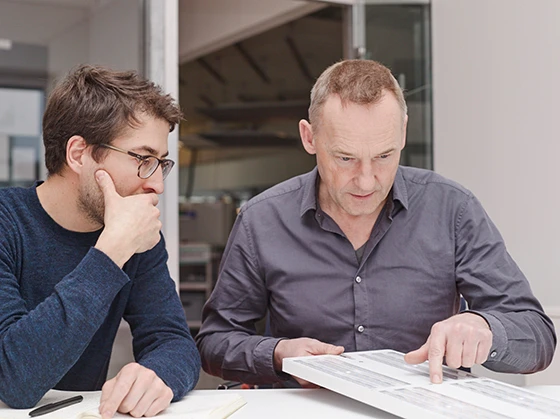 The Berlin product designer Rupert Kopp (right) in discussion with Moritz Merkel, product developer at the Nimbus Group. Photo: Frank Ockert