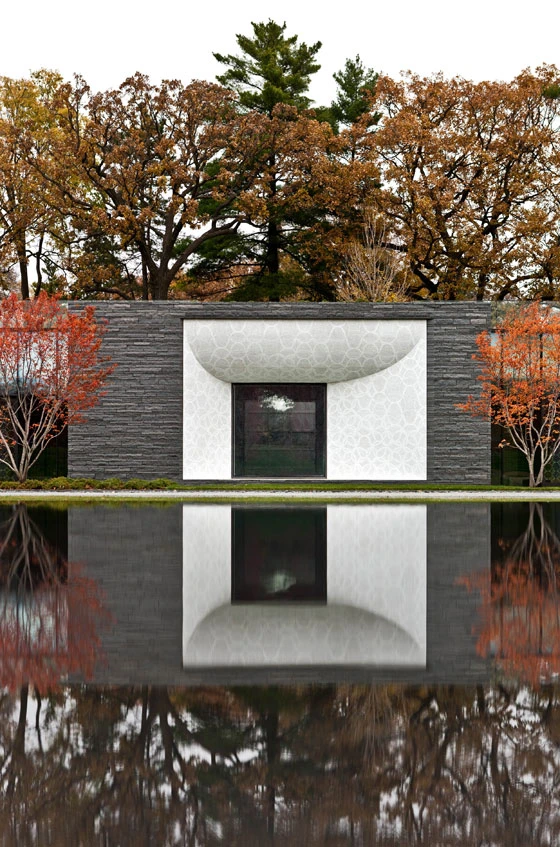 A mosaic made from white glass and Carrara marble covers the surfaces surrounding the entrances and windows of the Lakewood Garden Mausoleum by HGA; photo:Paul Crosby