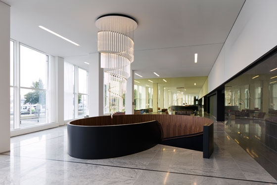 The cylindrical Tooby lamps can be configured to create spectacular bespoke lighting designs, such as this spiralling chandelier produced to be installed above a staircase
