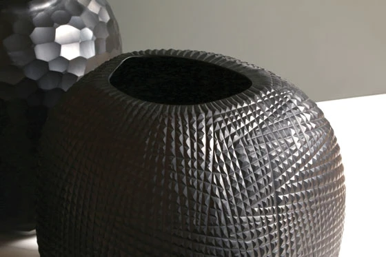 Accessories from GUAXS feature a distinctive play of materials, surfaces, and textures. Every piece is handmade by traditional methods; photo: GUAXS