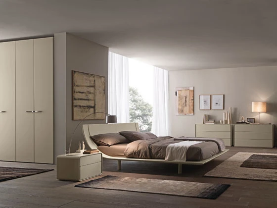Pierangelo Sciuto’s design for the Aqua double bed expresses the utmost in lightness, blending modernity and versatility. A single curved panel turns this double bed into a refined work-of-art
