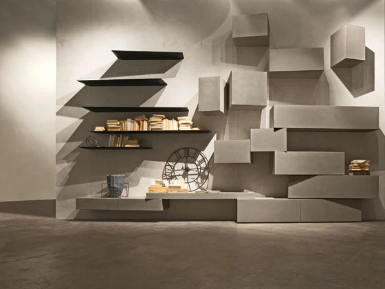 InclinART is an exclusive modular furniture system designed by Pierangelo Sciuto that changes the basic rules governing furniture. The tops are no longer parallel with the wall but slant towards the onlooker