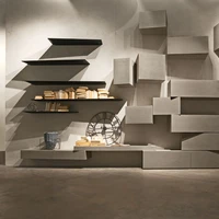 InclinART is an exclusive modular furniture system designed by Pierangelo Sciuto that changes the basic rules governing furniture. The tops are no longer parallel with the wall but slant towards the onlooker