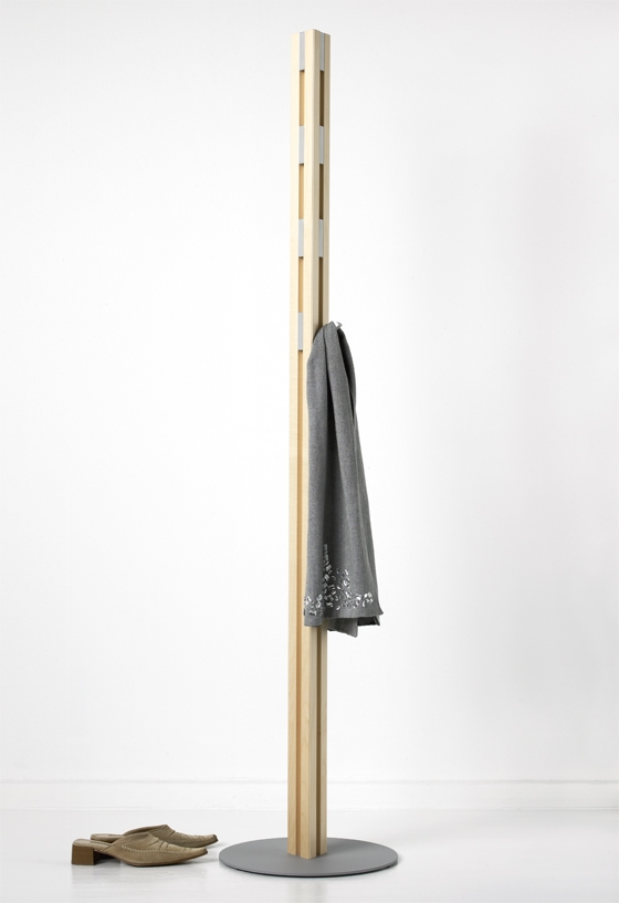 The Knax Hall stand is made from solid wood. Its 12 aluminium hooks sit flush when not in use