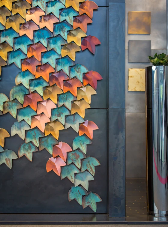 For internal use, the company manufactures a range of metal products that can be used as wall or floor coverings. Designs such as Copycat and Vertical Green demonstrate the material’s artistic potential