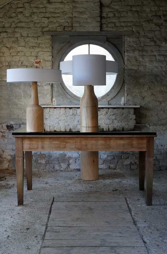 The Anna Belle table lamp collection, which pairs a crisply minimalist white shade with a more organic wood base. This versatile line plays with proportions, thanks to its shades and bases in various shapes and sizes