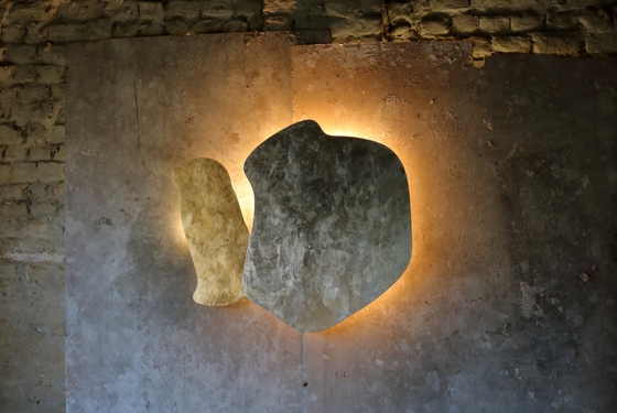 Top and above: Nature is a big influence on Rabii’s unpredictable designs. This is particularly evident in her Yaya lights with their organic forms. Golden indirect light emanates from their irregular edges
