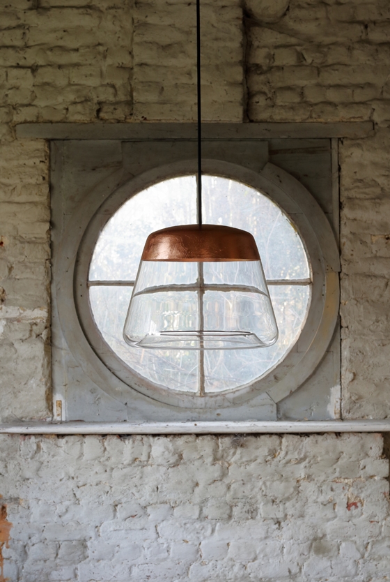 Both rich-looking and ethereal, Hind Rabii’s Ice Absolute light juxtaposes transparent glass with a band of copper, counterbalancing opacity with transparency