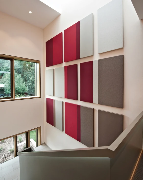 The panels can be mounted on the wall or hung from the ceiling as desired