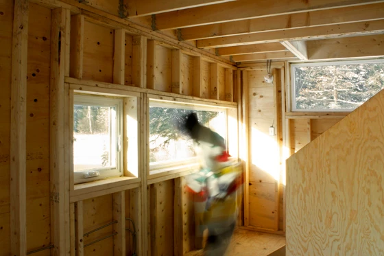 Elevated via a series of recycled-gas-pipe pilotis (in response to the site's high water table), Canadian office DIN Projects’ Manitoba Pole House features an interior that leaves the structure's frame exposed. Photos: DIN Projects