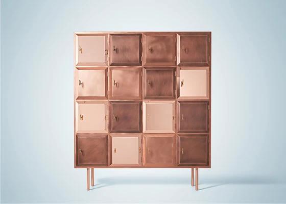 Nika Zupanc’s “cabinet of wishes” showcases three copper finishes in across its collection of square compartments, which each come with a glossy copper key - a recurring motif in Zupanc’s work