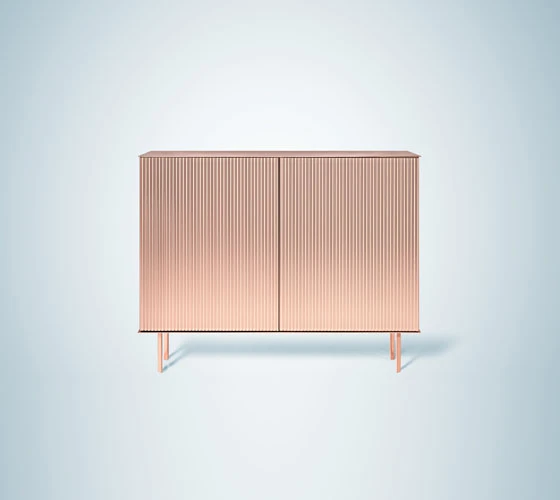 Volte (top) by French designer Constance Guisset features a timber structure wrapped in délabré copper. Nathalie Dewez’s polished copper Elizabeth cabinet (above) with its plissé facade demonstrates De Castelli’s incredible bending techniques