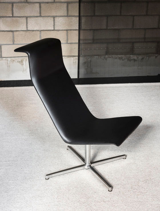 Launching at this year's Salone del Mobile: Alain Berteau revisits his successful TAB chair for Bulo, with its distinctive 'folded' profile. Shown here, the new lounge chair version