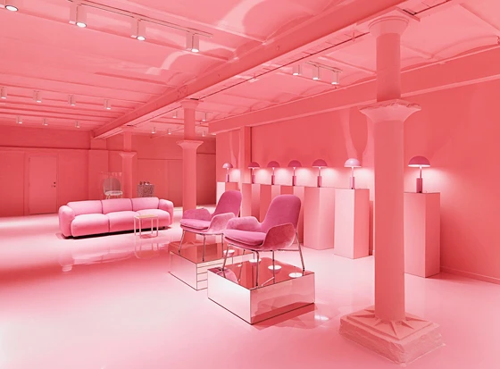 New interventions including an entrance corridor lined with metal panels contrast with heritage features at Normann Copenhagen’s showroom. Photos: Jeppe Sorensen