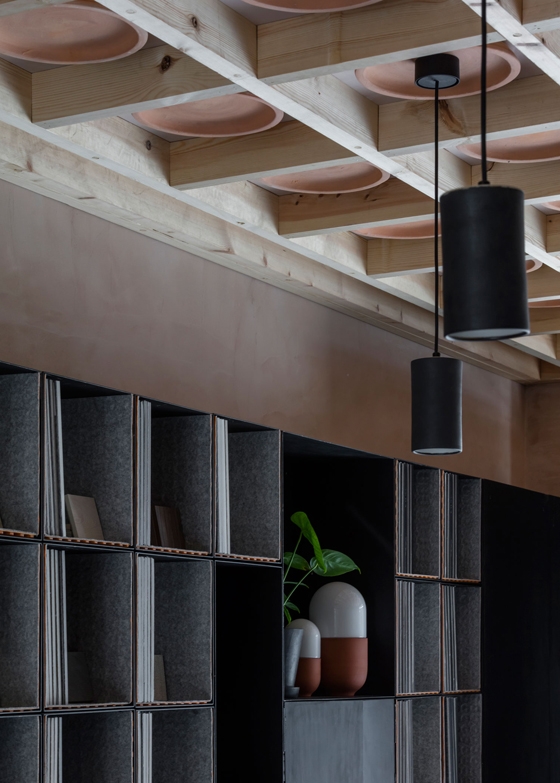 UK architect Simon Astridge incorporated many textured surfaces - from corten steel to exposed plasterwork and clay - in his showroom for Pentagon Tiles to encourage visitors to touch the product. Photos: Nicholas Worley