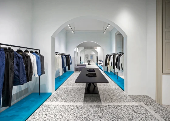 As visitors to Issey Miyake’s Milan store proceed from one floor to the next, they’re hit by the dramatic contrast between its traditional interior and rainbow-hued clothes, starkly lit by tracklights. Photos: Olivier Baco